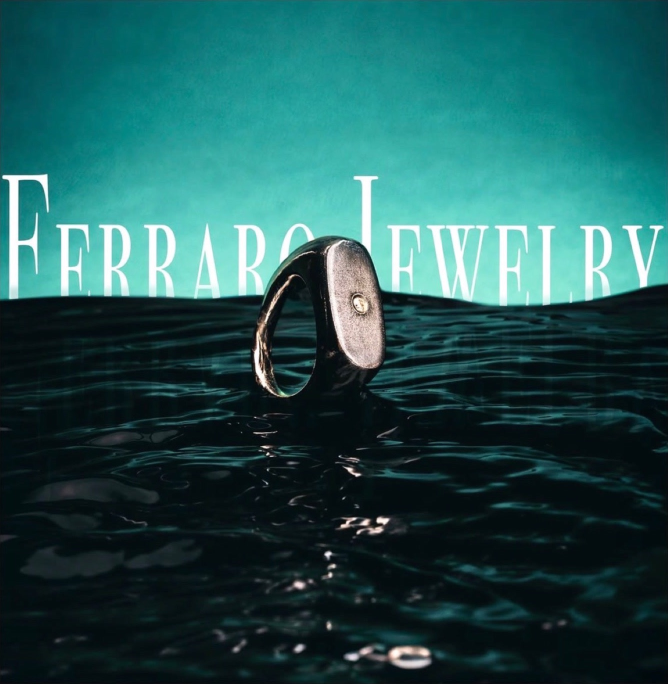 Dark oxidized signet ring with a single small set stone, standing in black water against a teal backdrop, with the words Ferraro Jewelry lettered across the water